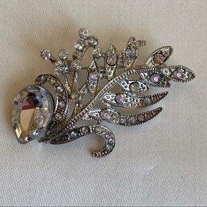 Iridescent Crystals galore in this pin brooch    Add to any scarf for some bling